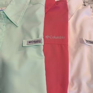 Three short sleeve Columbia sun protective shirts.